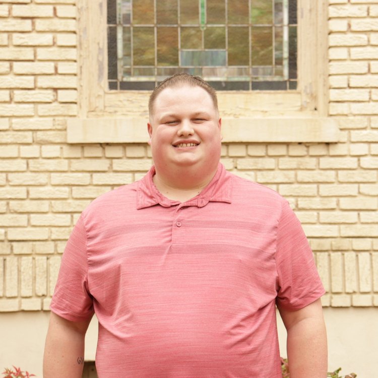 Lane Vanveckhoven wearing a pink shirt
